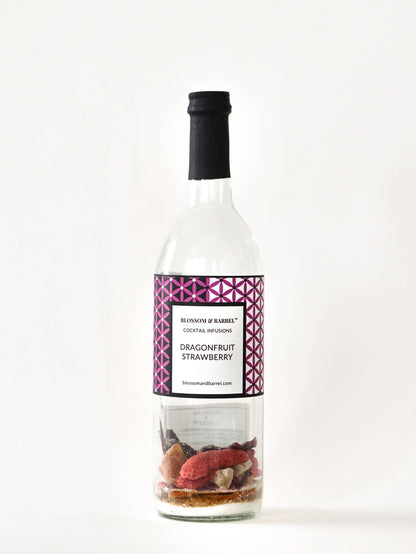Bottle of dragonfruit strawberry cocktail mix on a white background