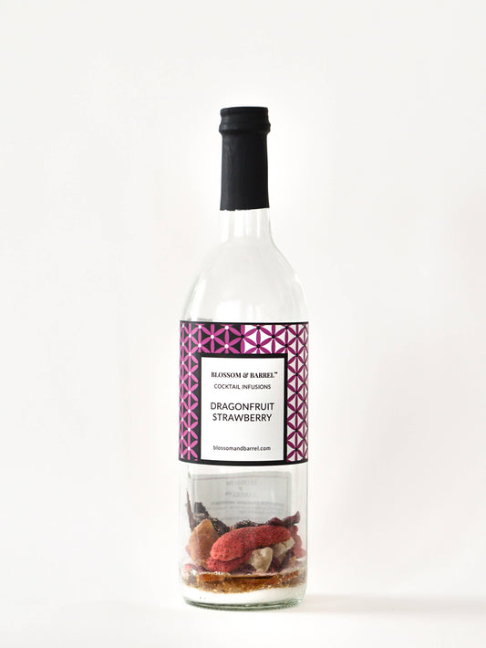 Bottle of dragonfruit strawberry cocktail mix on a white background