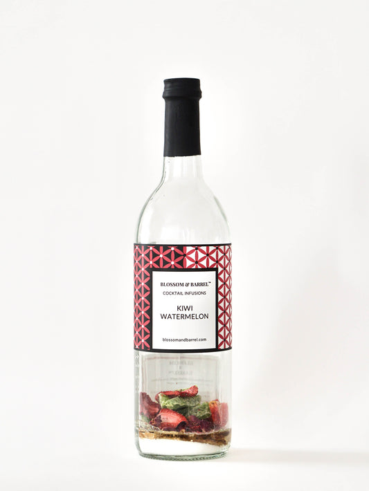 Bottle of kiwi watermelon cocktail infusion on a white background